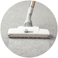 Vacuum cleaning a carpet